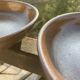 Deep plates made of organic, wild, earthy marsh clay.