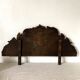 Pediment in blackened wood and 19th century embossed gilded metal foil