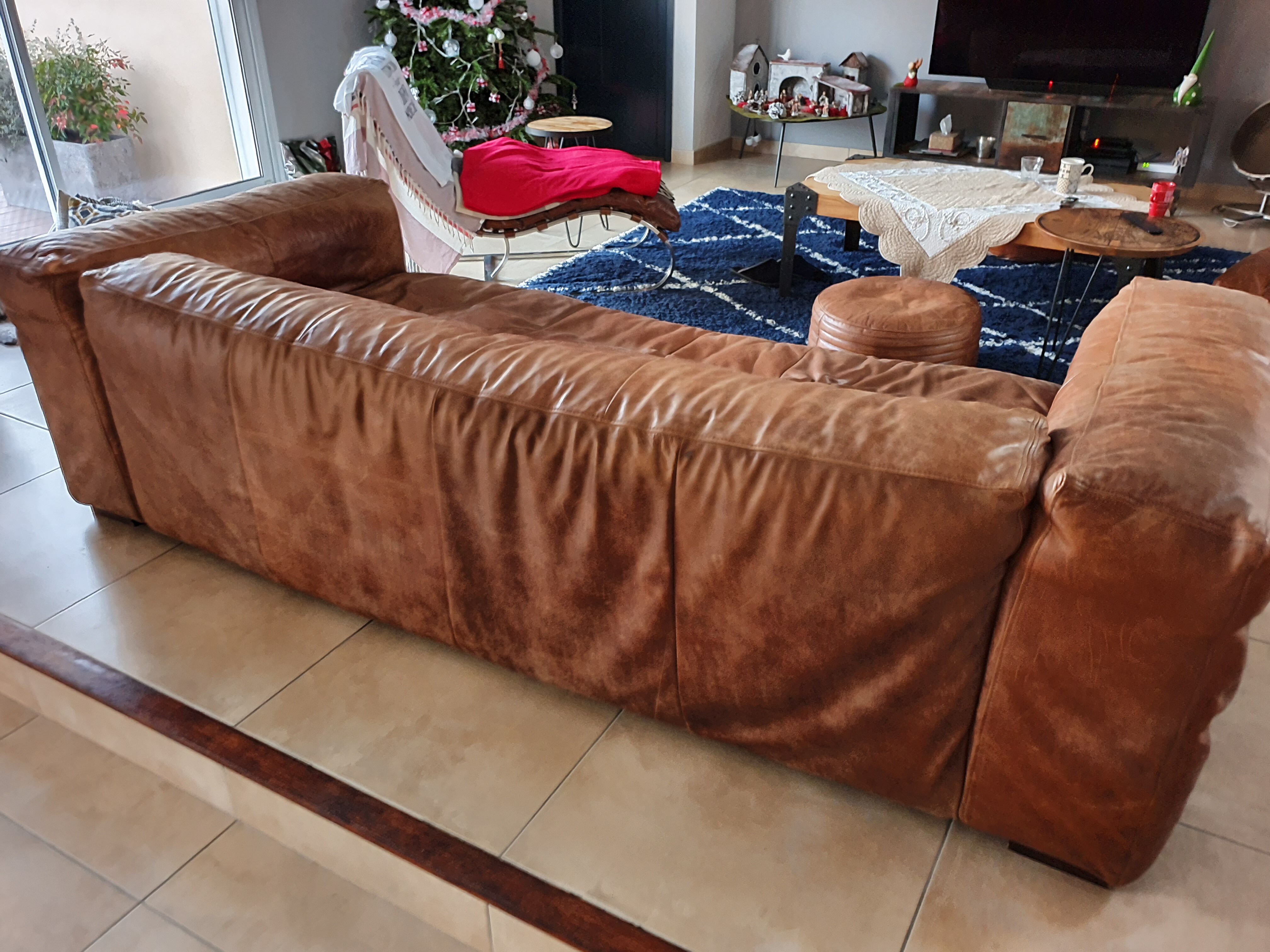Vintage brown aged leather sofa