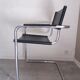Fauteuil en inox et cuir