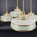 Set of 4 Art Deco pendant lights in frosted water green and gold.