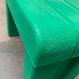 Postmodern plastic stool with a wood effect.