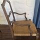 Paire de fauteuils anciens en bois avec assise tressée + coussins