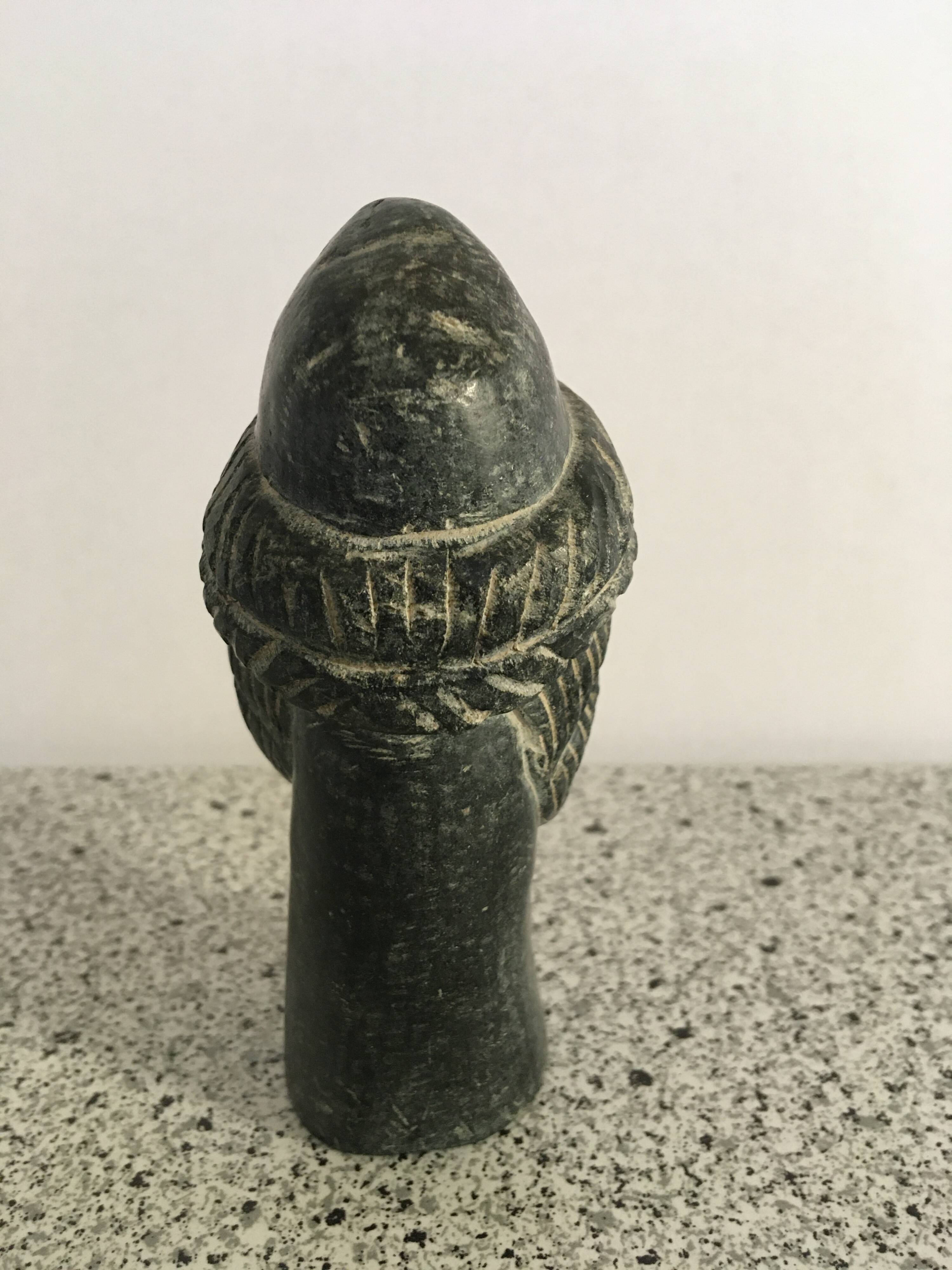Black marble bust sculpture