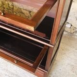 Vintage mahogany avocado bookcase with overhead glass doors circa 40's/50's