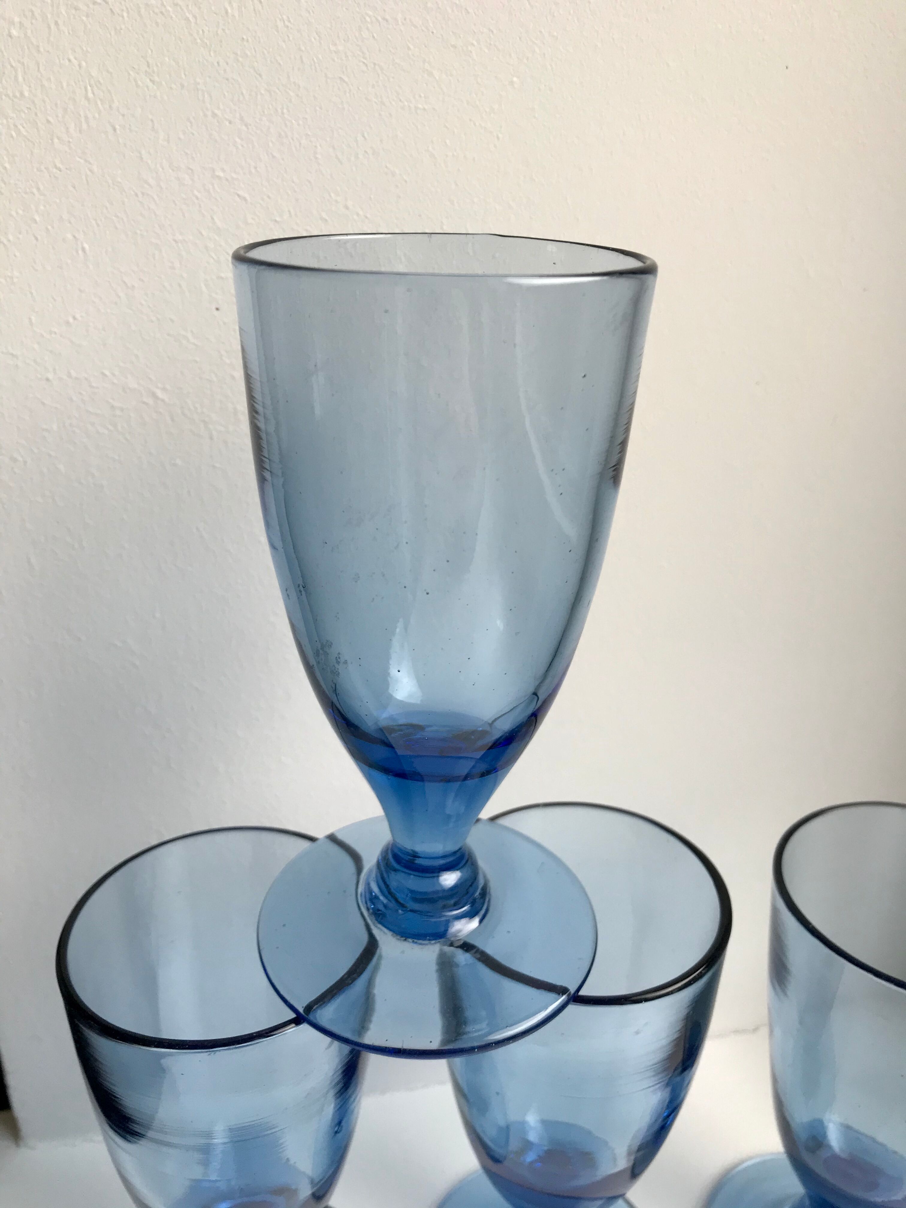 Set of 4 20s blue molded glass foot glasses