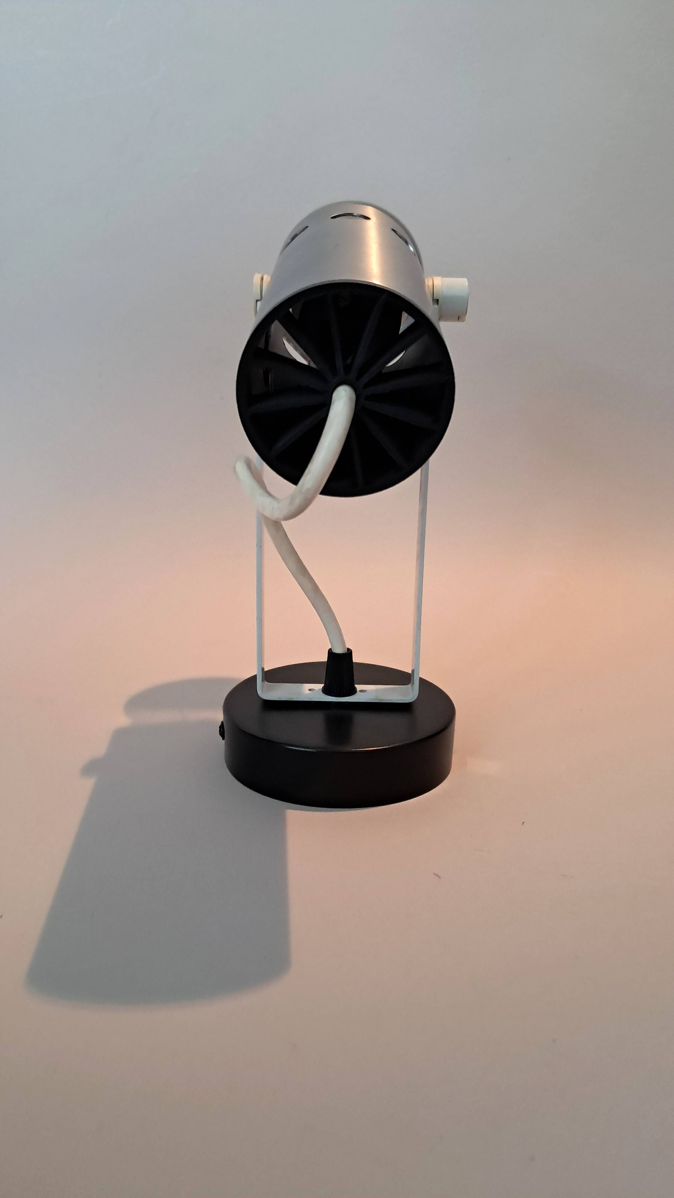 Modernist adjustable wall light in brushed aluminium, 1970s Vintage.