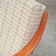 Pair of Boomerang-style armchairs in ecru beige fabric, 1960s.