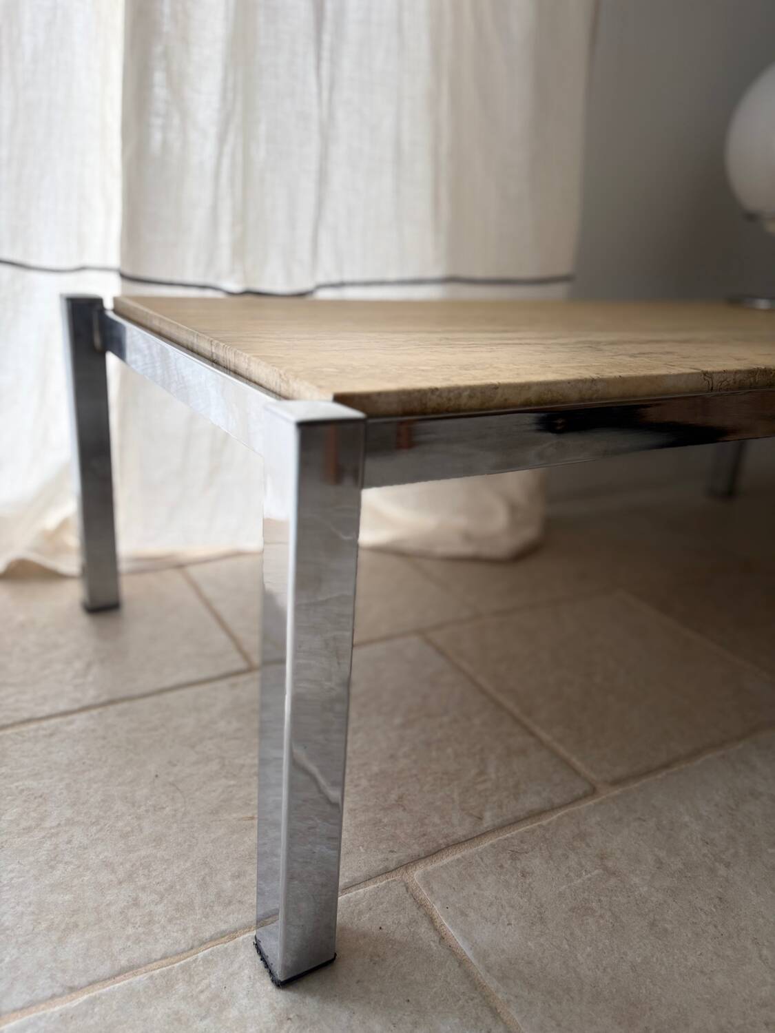 Chrome metal and travertine coffee table, 1970.