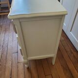 Dresser repainted in off-white and grey-pink colours.