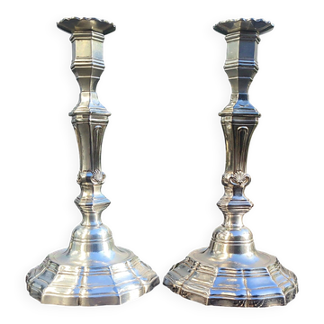 Magnificent pair of silver candlesticks.