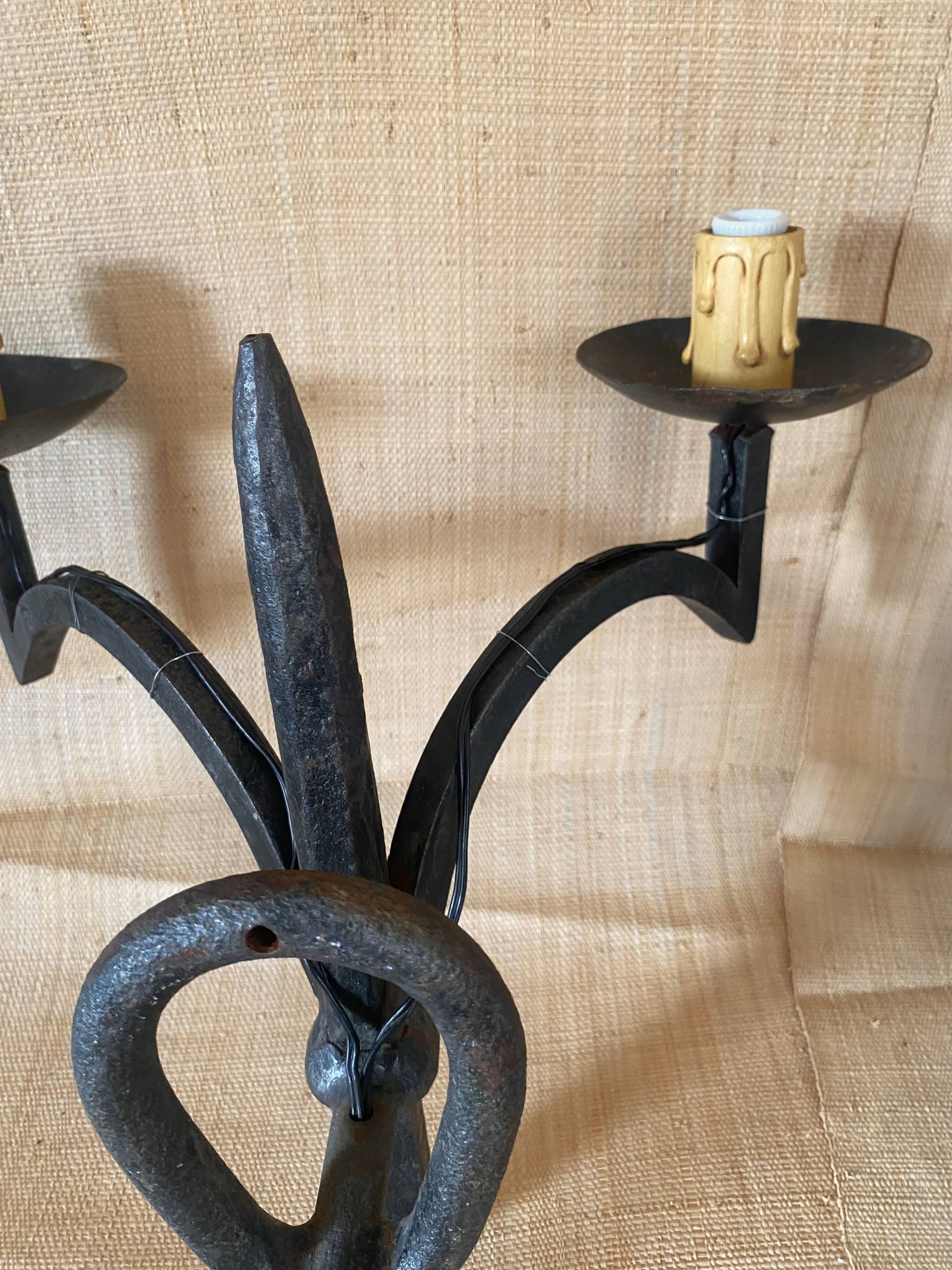 Wrought iron wall lights.