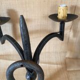 Wrought iron wall lights.