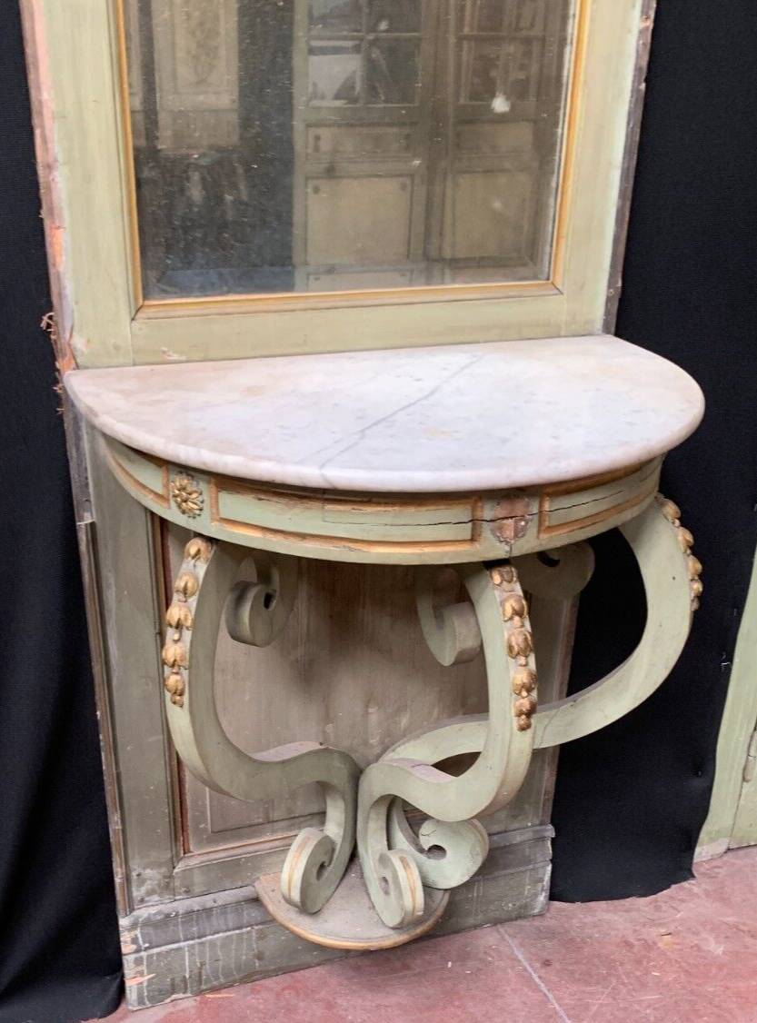 Napoleon III style mirror and woodwork console in 19th century patinated wood