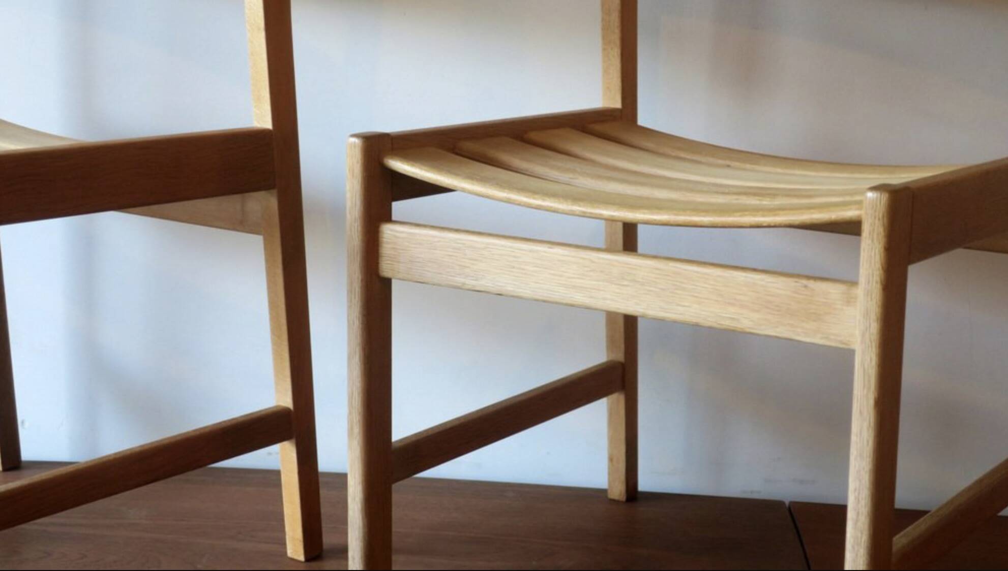 Pair of solid ash wide-seat dining chairs by Kurt Ostervig for KP Mobler, Denmark 1950s