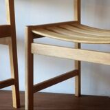 Pair of solid ash wide-seat dining chairs by Kurt Ostervig for KP Mobler, Denmark 1950s