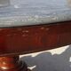 Empire guéridon in mahogany and marble, revolving top.