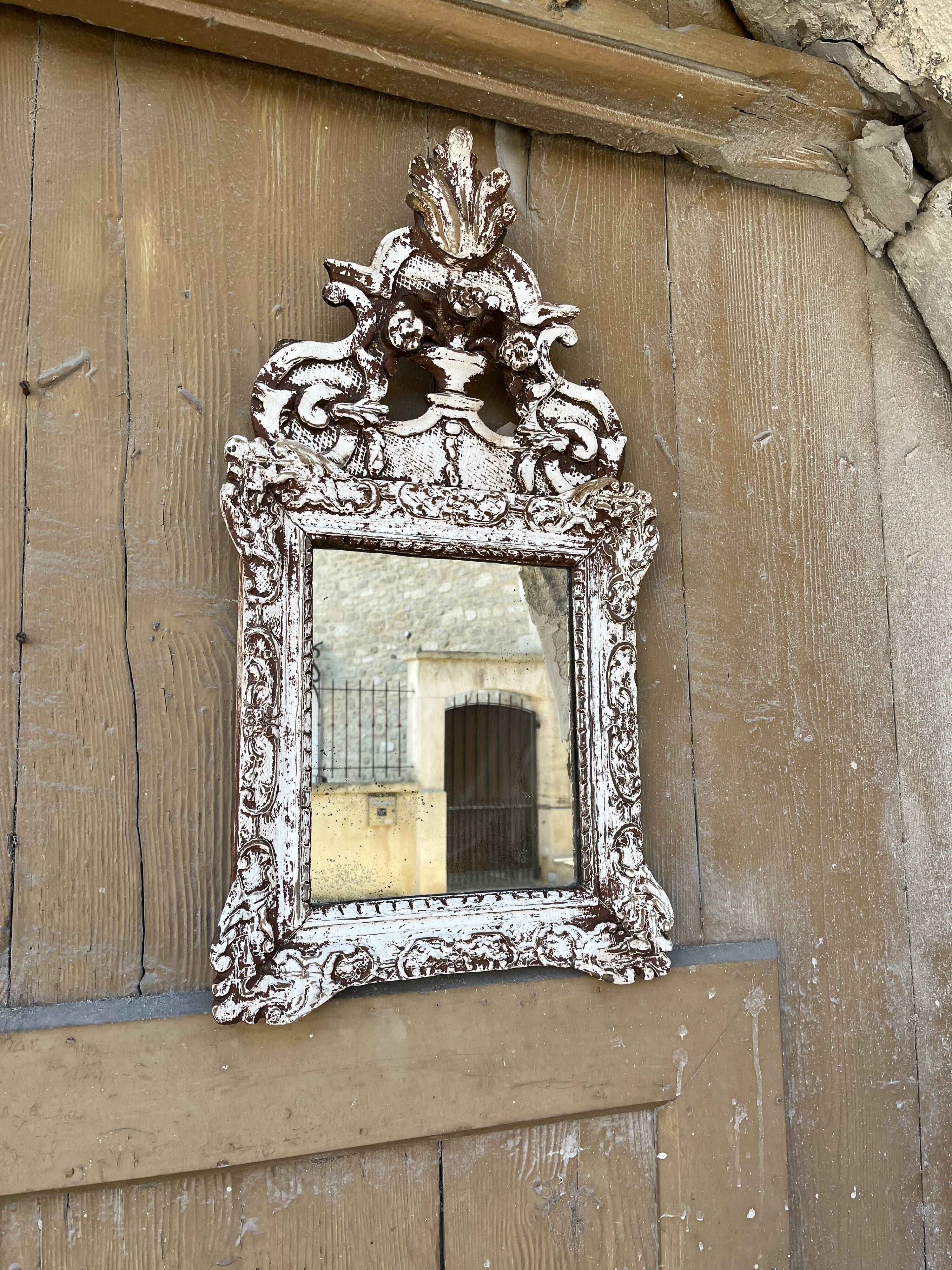 Carved wooden mirror