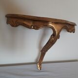 Wall shelf in gilded wood