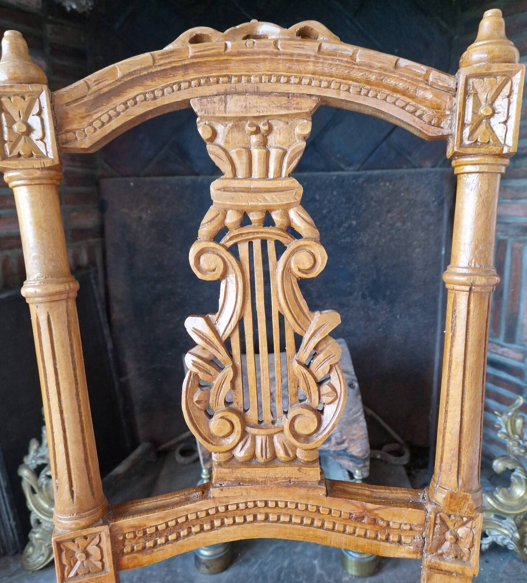 Lyre back chair in carved wood, Louis XVI style, late 19th century.