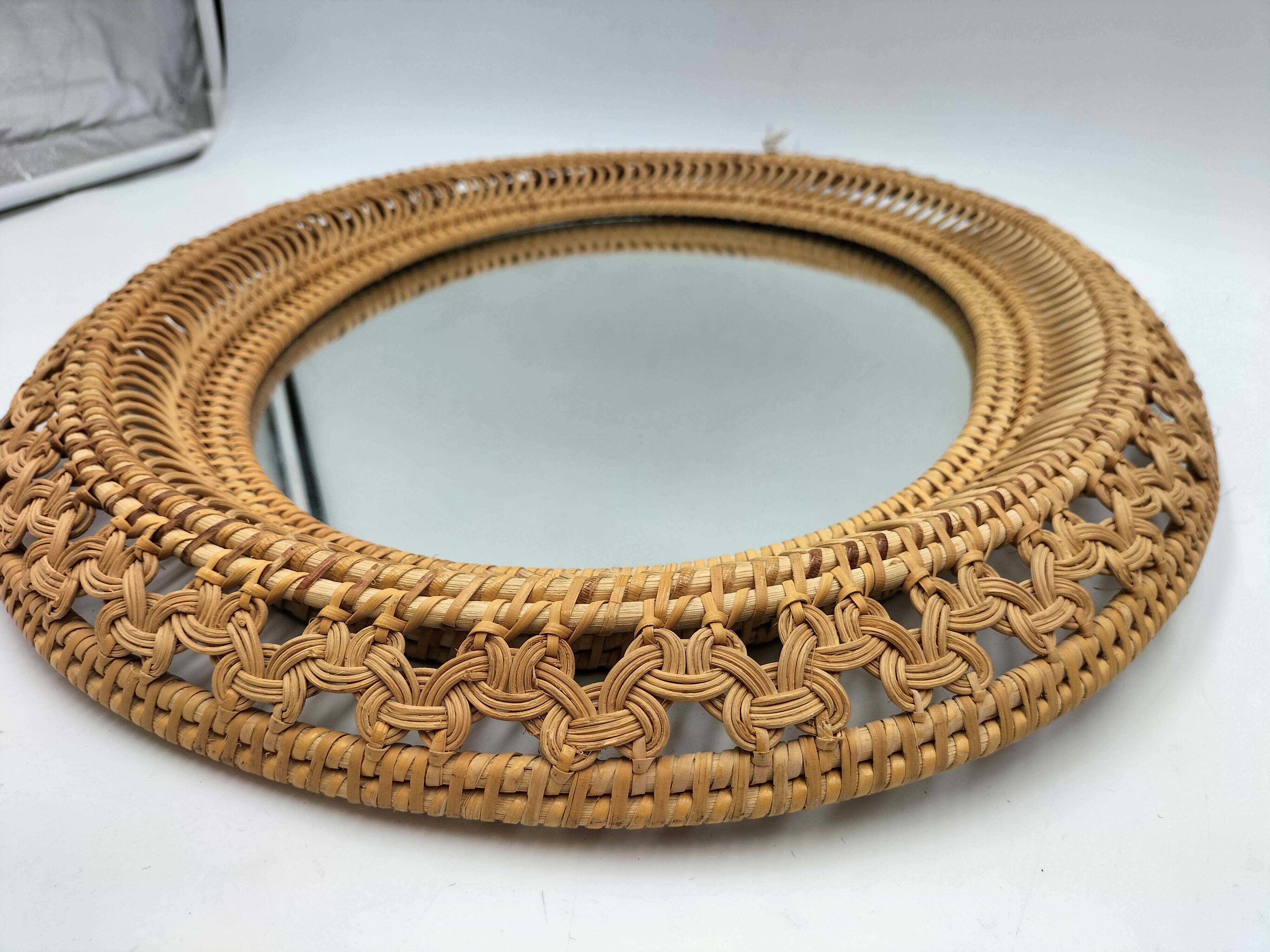 Oval rattan mirror