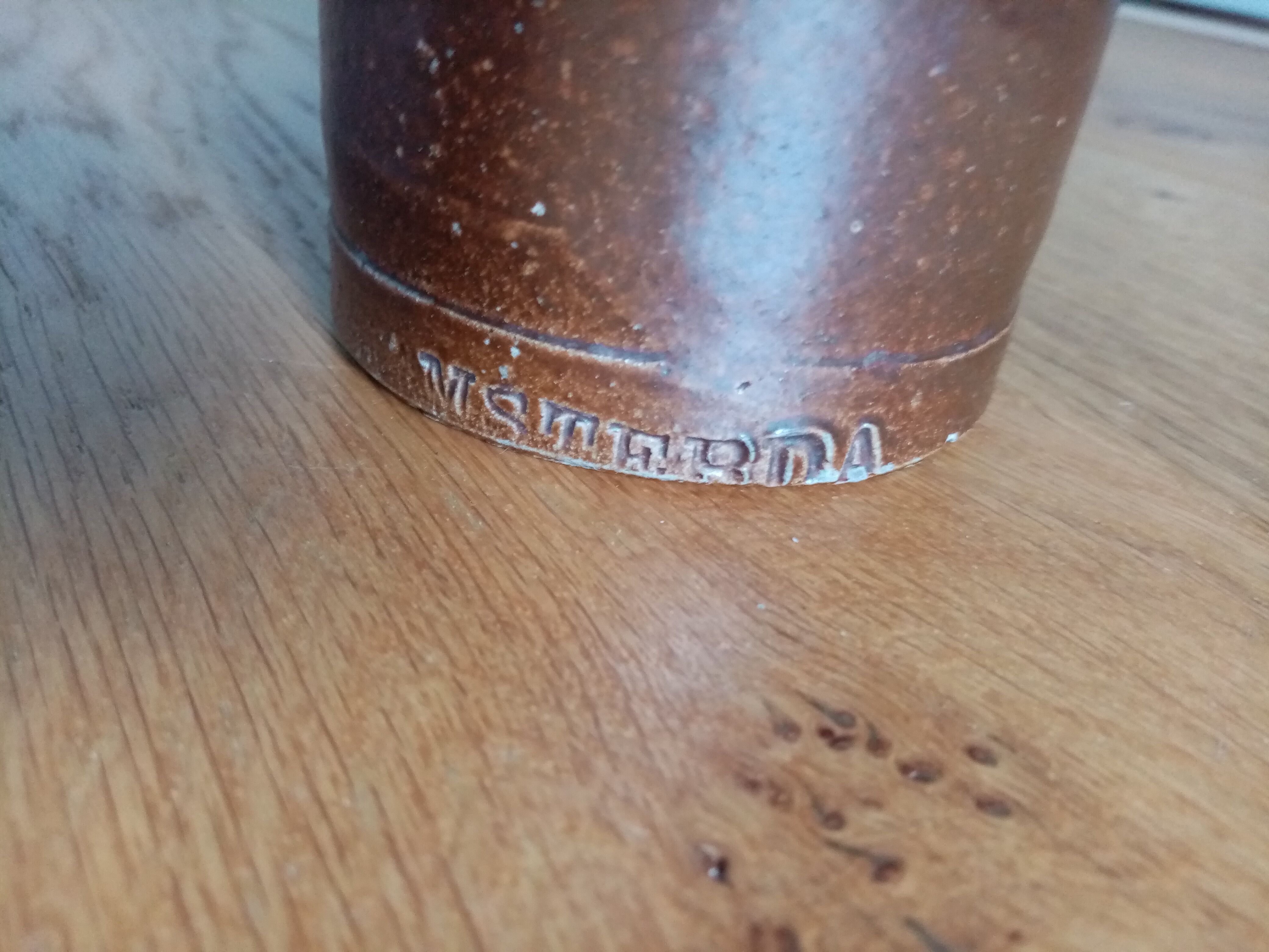 High bottle with brown enamelled sandstone handle Amsterdam