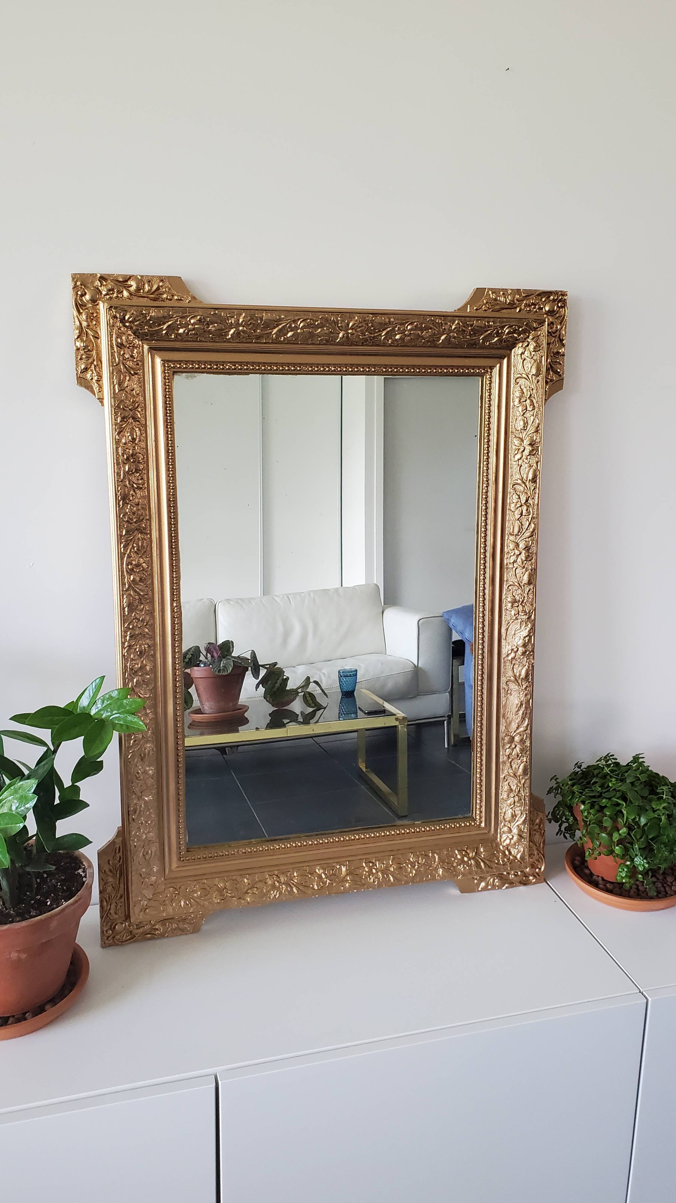 Antique mirror with gilded wood crests