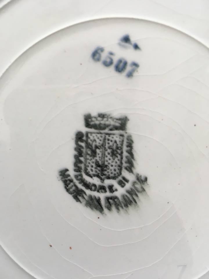 Together six dinner plates old mismatched bluish green.