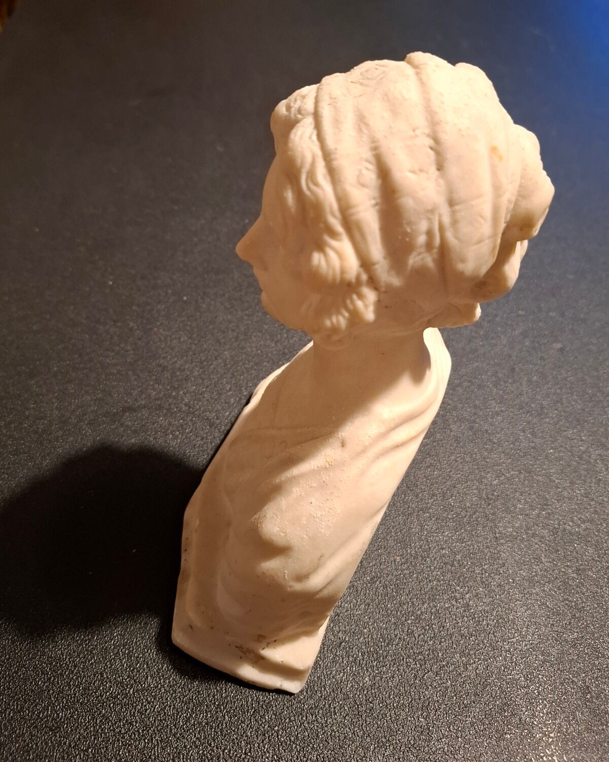 Female bust in stone