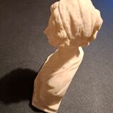 Female bust in stone