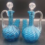 Cabaret Portieux liqueur service with 10 blue and clear glasses.