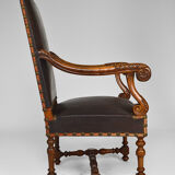 Louis XIII office armchair in leather and walnut carved around 1860