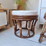 Rattan and boucle fabric pouf