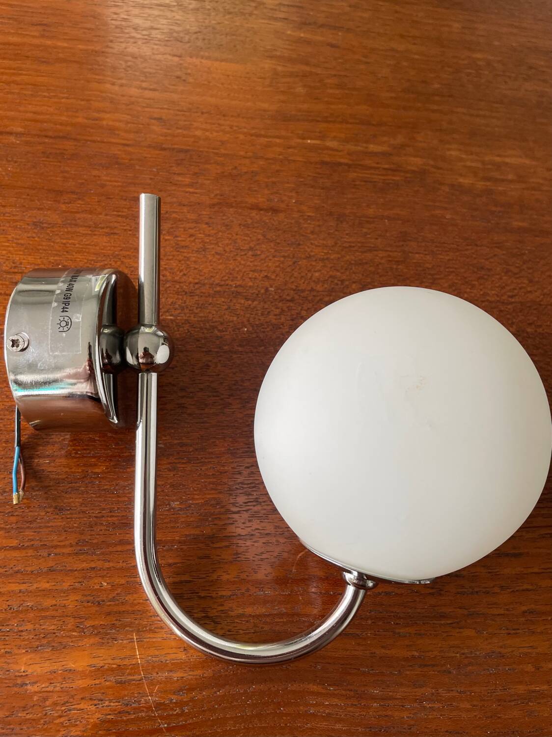 Chrome metal wall light and opaline ball