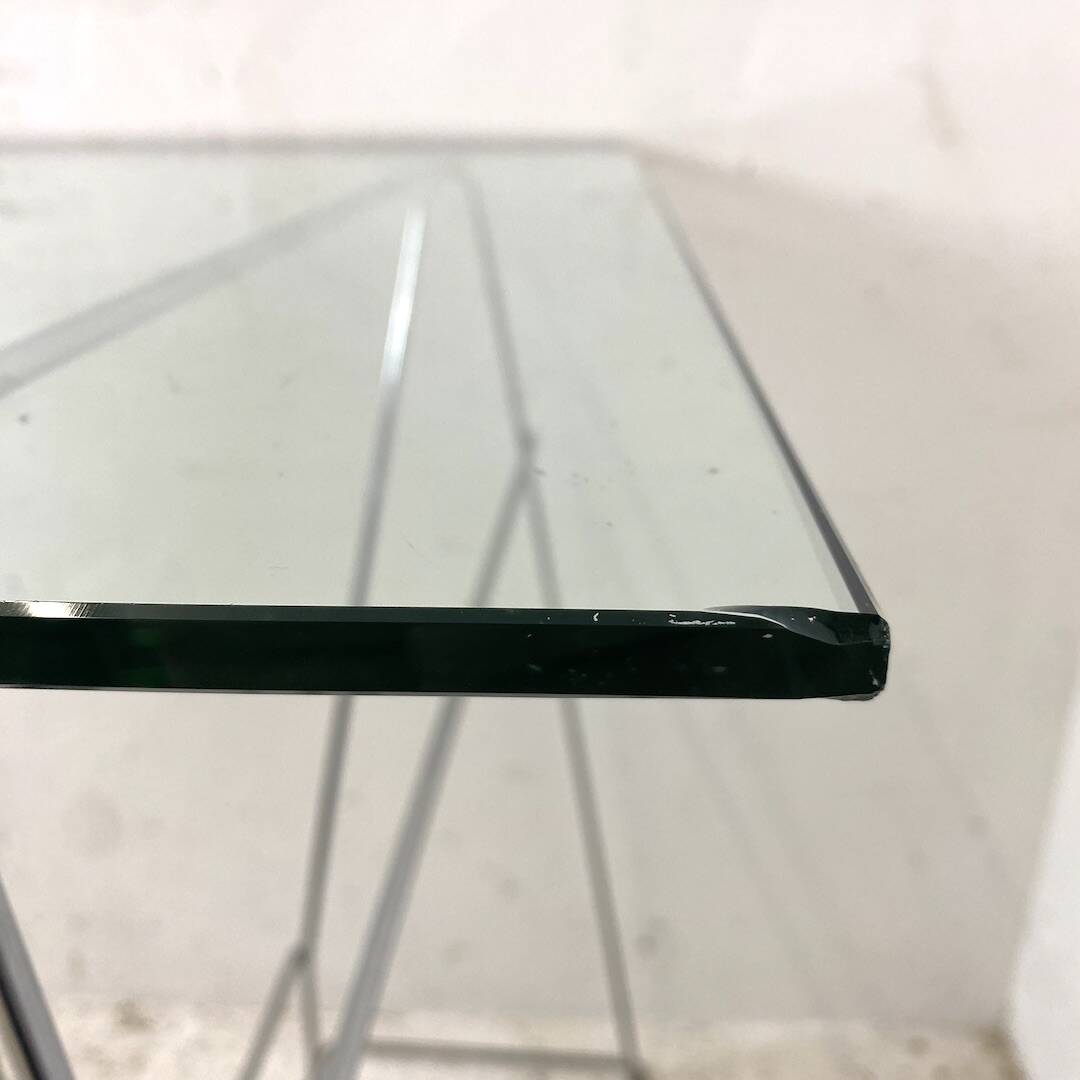 Minimalist glass and metal desk from the 1970s
