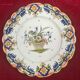 Plate in earthenware of Desvres