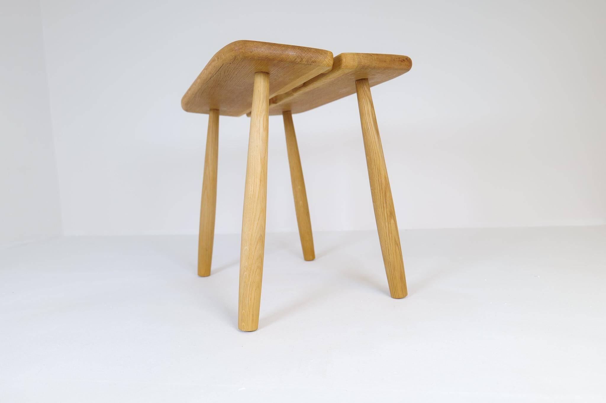 Sculptural mid-century stool in solid oak by Carl Gustaf Boulogner, Sweden, 1950s.