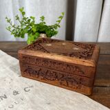 Carved wooden box with brass inlay