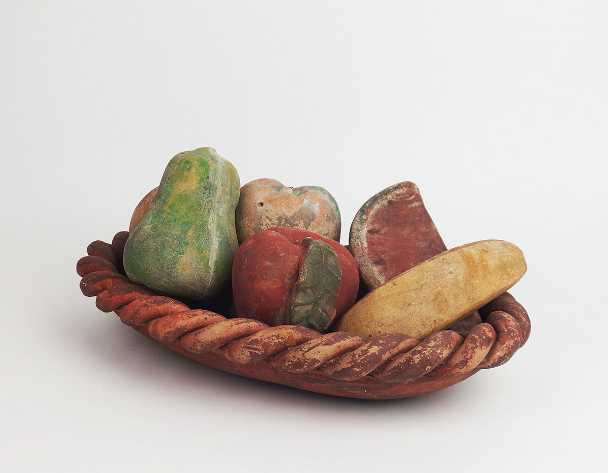 Basket and terracotta fruit