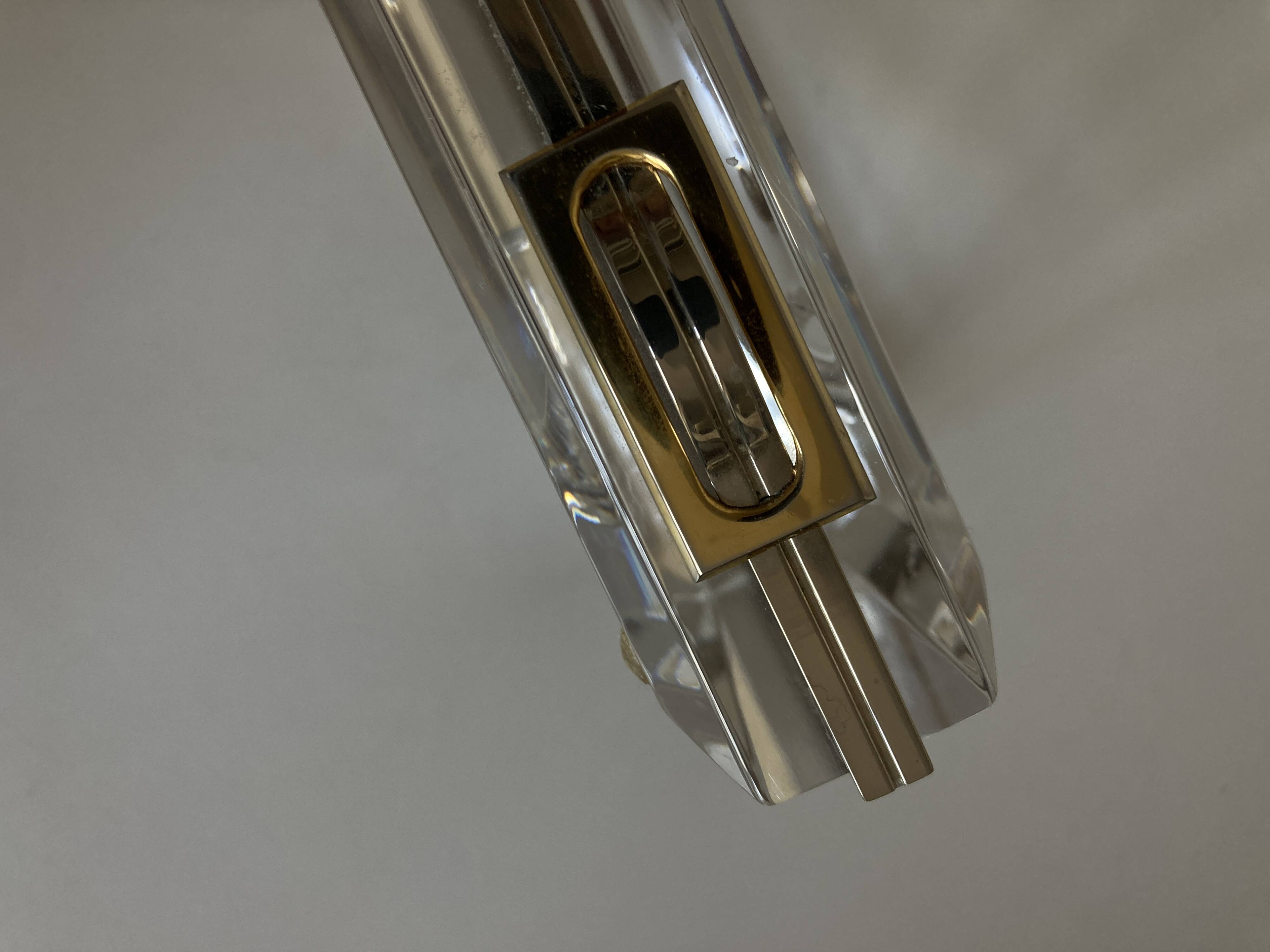 Plexiglas pocket emptier with brass and nickel silver surround, 1975, in the style of Pergay