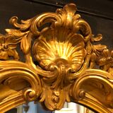 Golden oval mirror