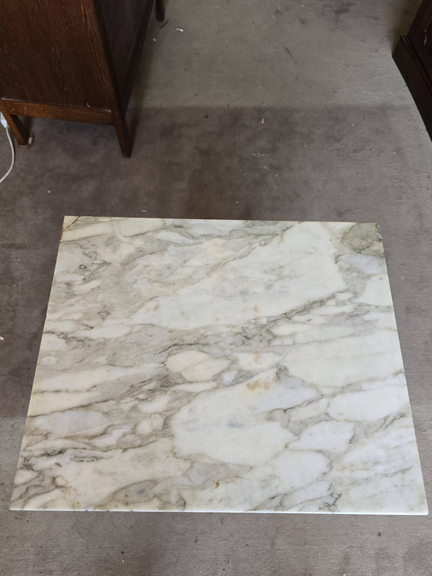 Antique Empire-style bedside table with marble top.