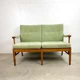 Two-seater sofa from the sixties with green upholstery
