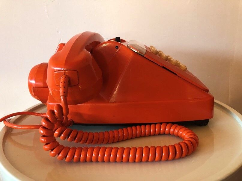 Orange Socotel phone with keys from the 70s 80s