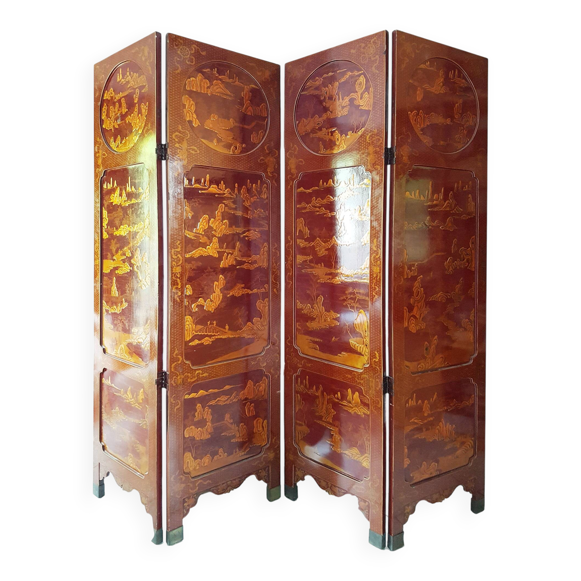 Four-panel Japanese-style screen in red and gold lacquer.