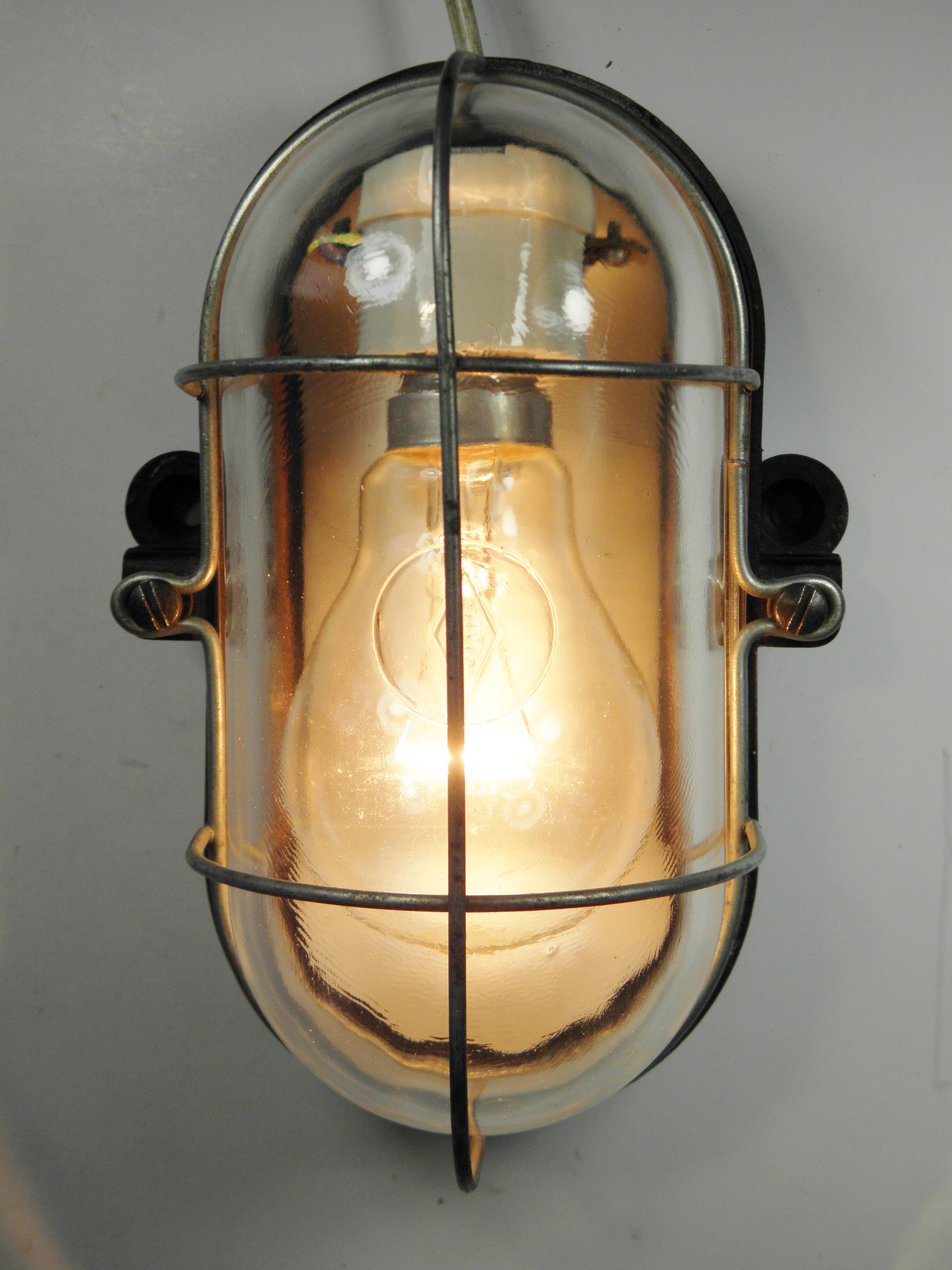 Glass and bakelite wall light