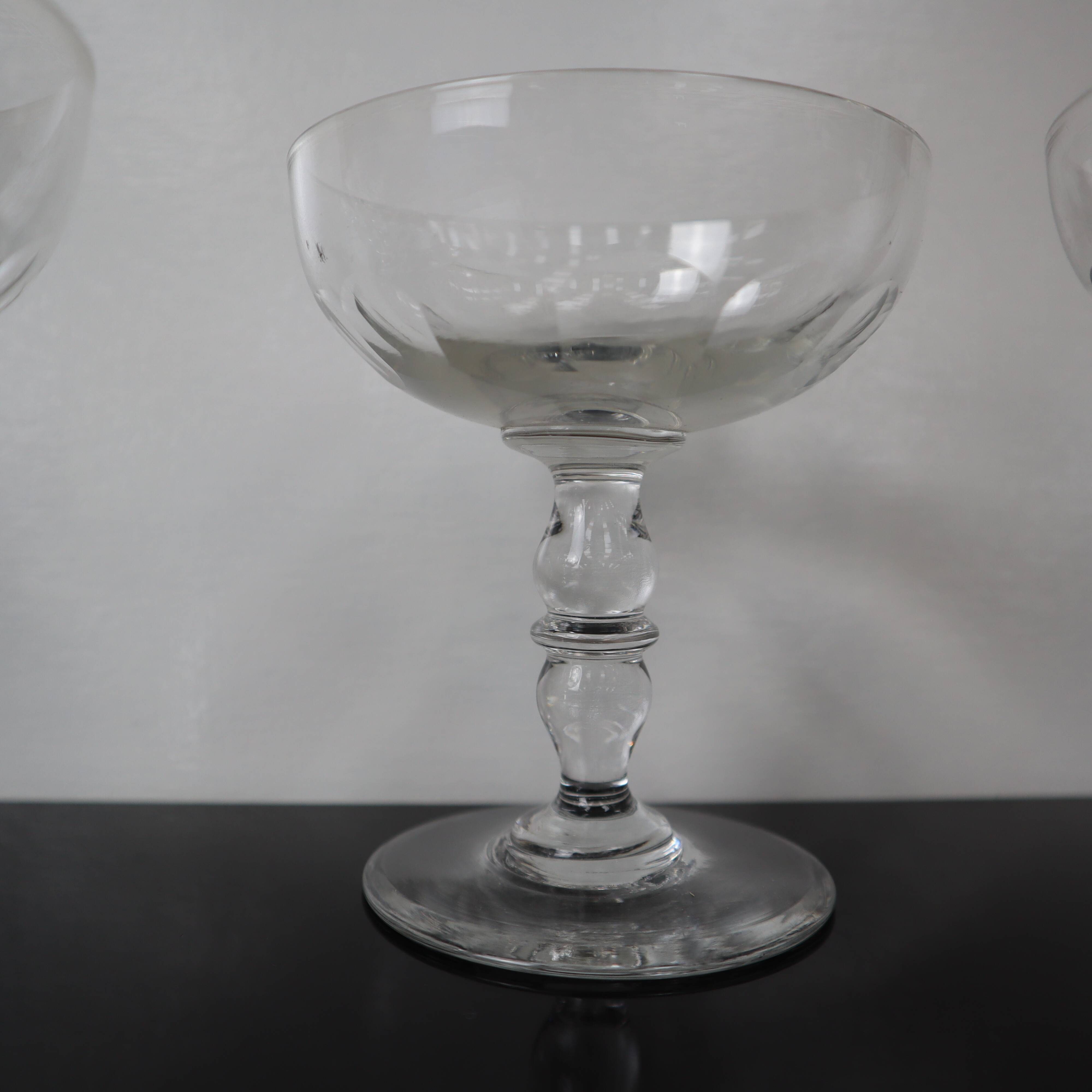 4 superb 20th century blown glass champagne glasses