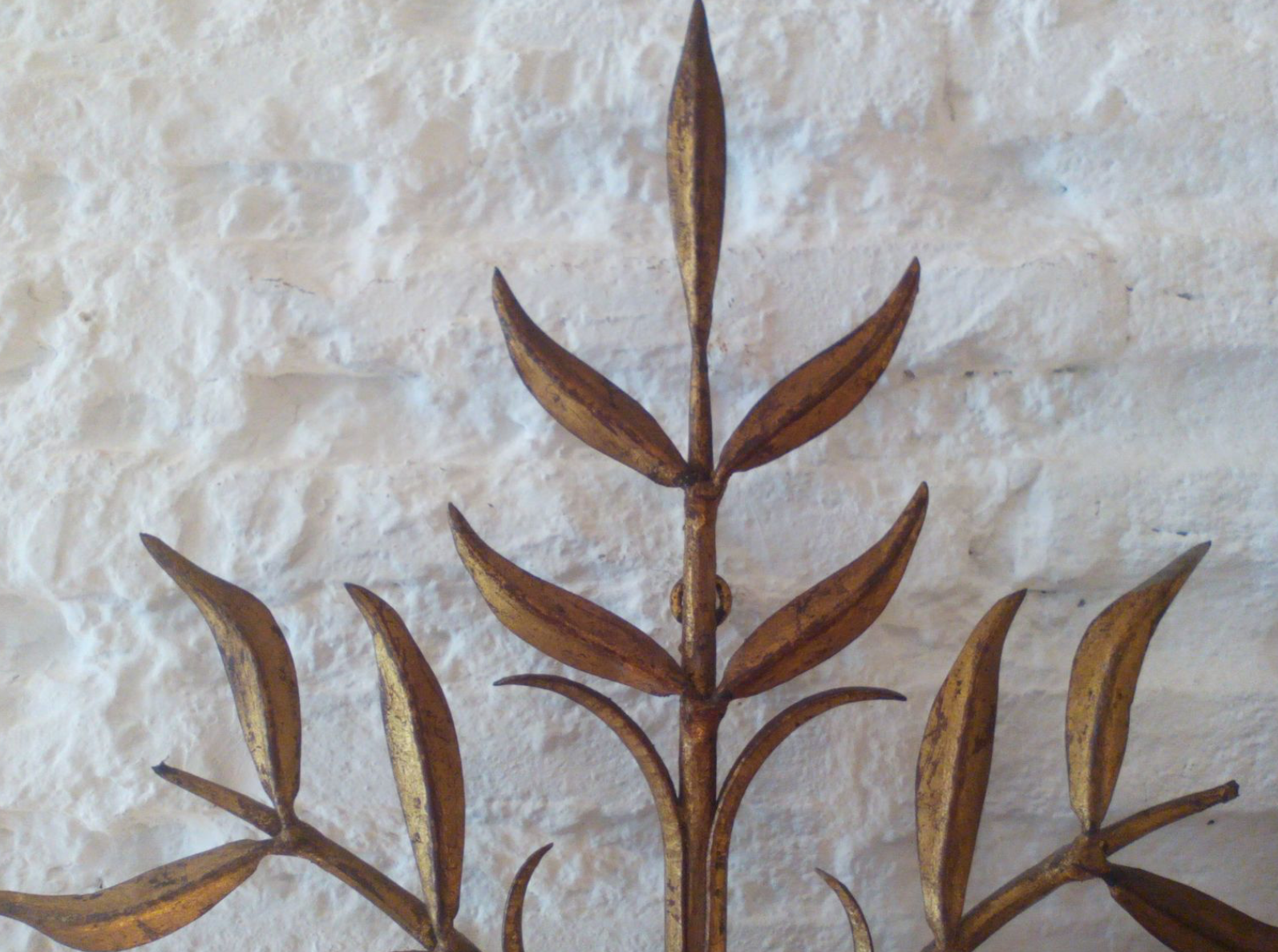 Floral applique in 1950s gold metal