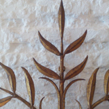 Floral applique in 1950s gold metal