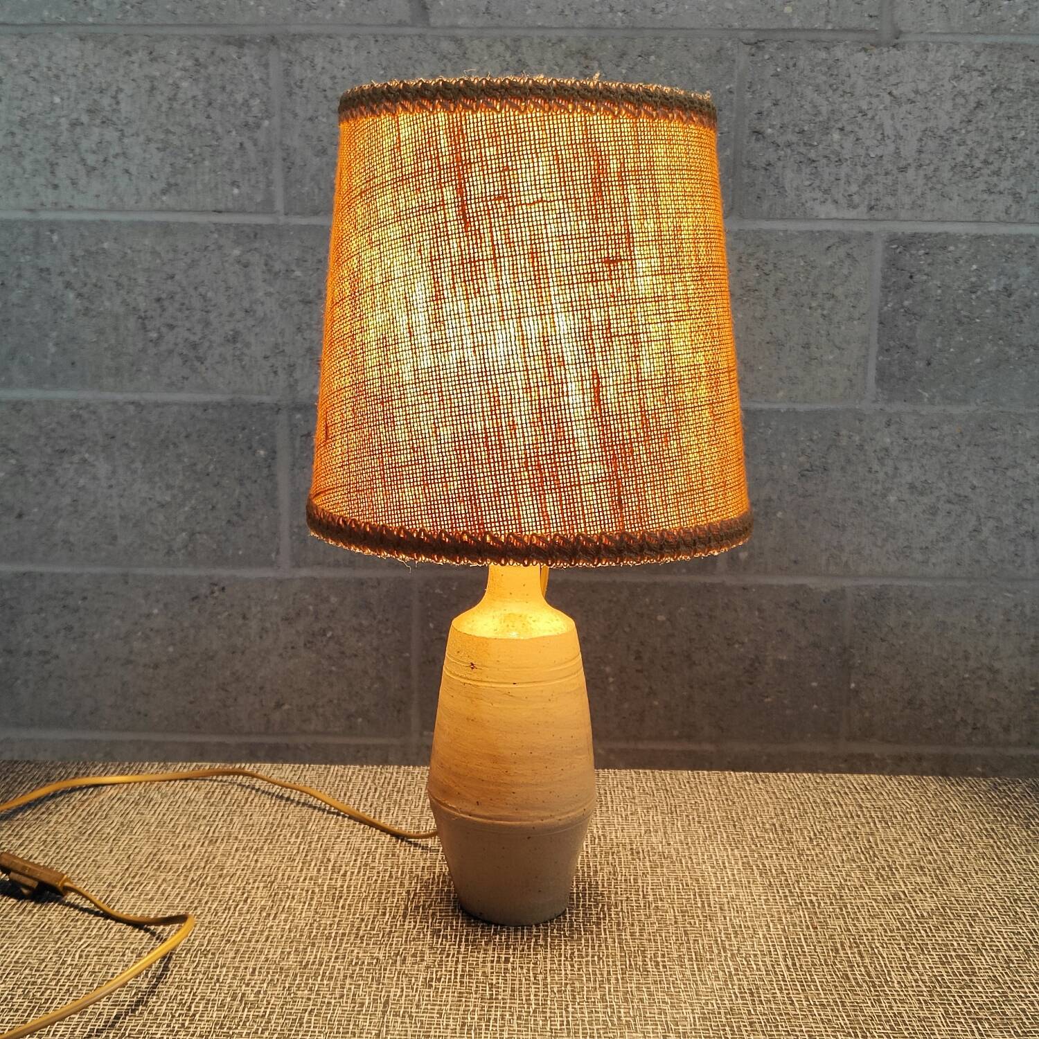 Patinated sandstone and jute ceramic lamp